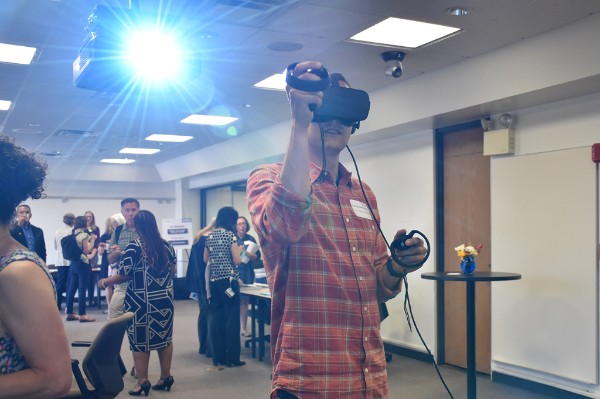 Open House Participant At The Open Lab Using Virtual Reality Equipment.