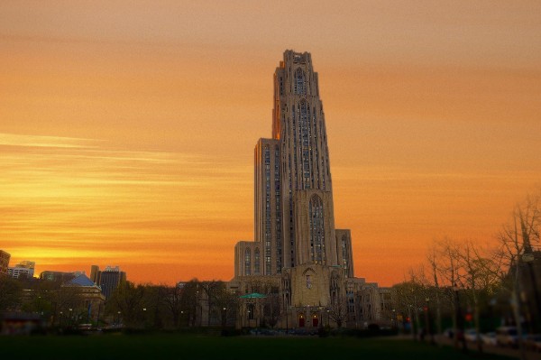 Cathedral Of Learning Against An Orange Sky.