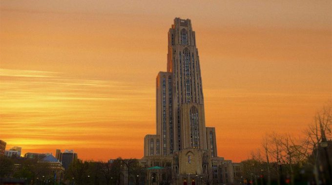 The Cathedral Of Learning With An Orange Sky In The Background