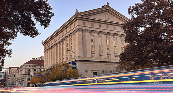 Alumni Hall At The University Of Pittsburgh With Light Streaks From Traffic.